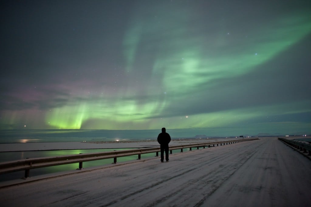 Watching the Northern Lights on a bridge