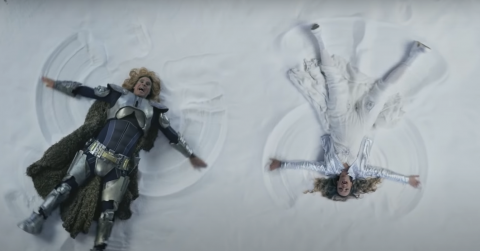 Will Ferrel and Rachel McAdams making snow angels in Húsavík